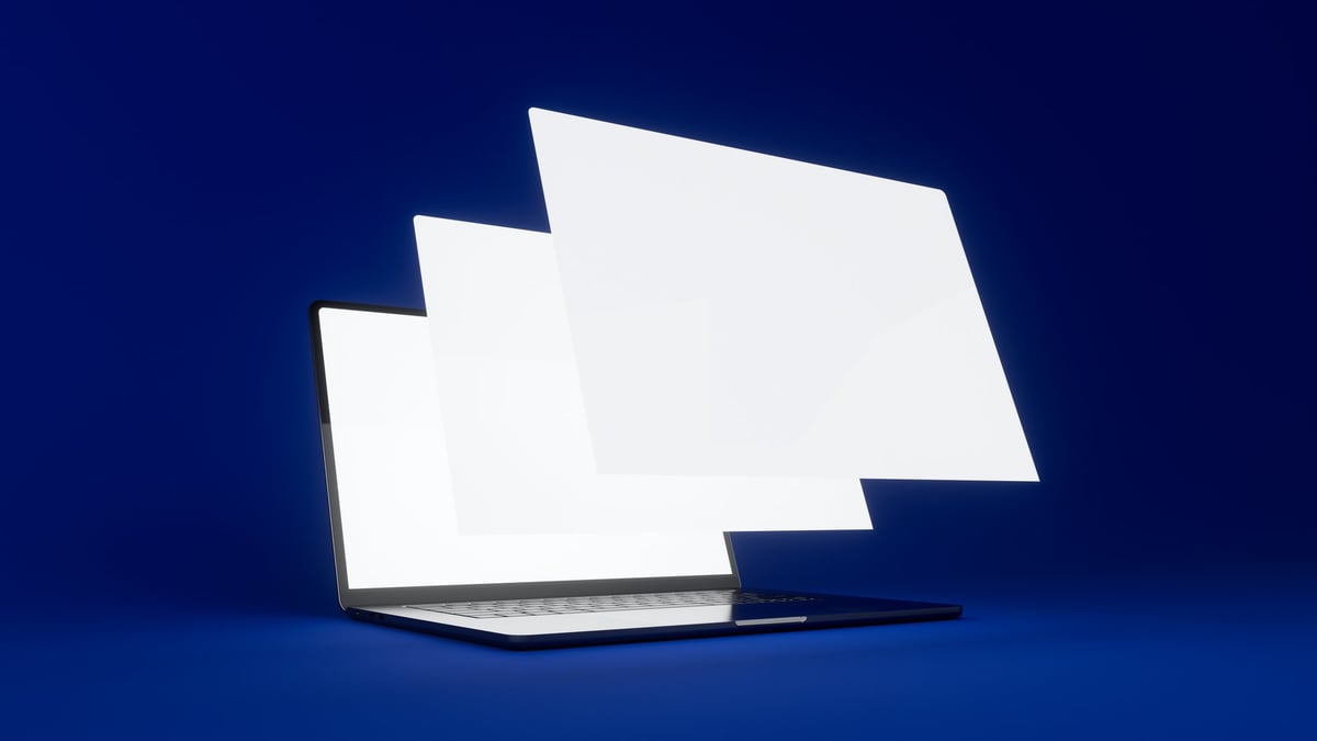 Laptop with three floating screens in the foreground. Blue background. Blank template for your website design. High-resolution rendering.